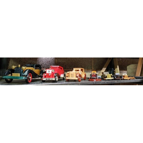 38 - SHELF WITH 8 DECORATIVE VINTAGE CARS & 2 METAL TIN TRAYS