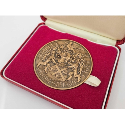 682 - A ROYAL MINT COMMEMORATIVE TONED BRONZE MEDAL TO MARK THE QUINCENTENARY OF THE COLLEGE OF ARMS IN 19... 