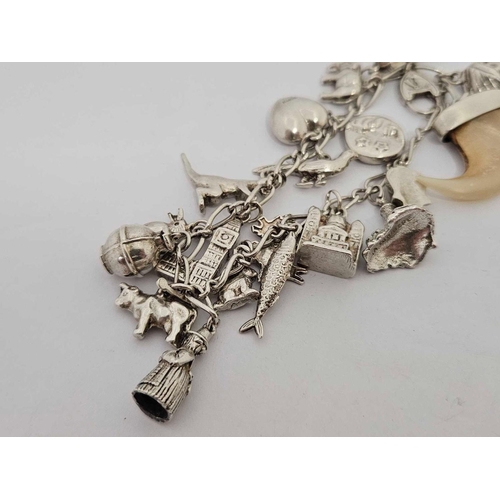 701 - HEAVY SILVER CHARM BRACELET