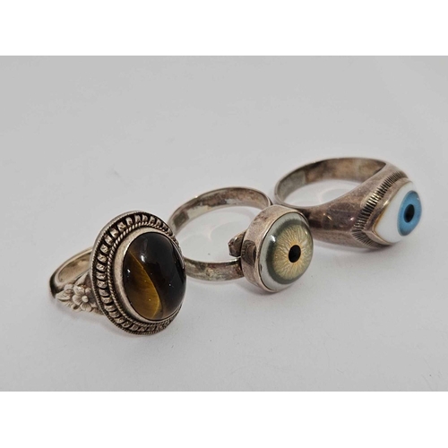 704 - 2 SILVER EVIL EYE RINGS & 1 SILVER TIGERS EYE RING