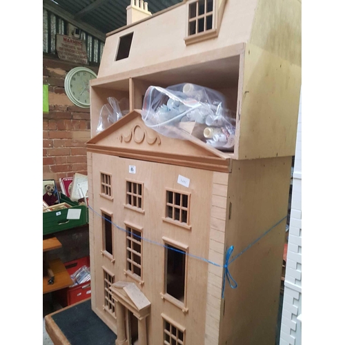 85 - BARE WOOD UNFINISHED DOLLS HOUSE IN 2 PIECES WITH 2 BAGS OF VARIOUS WALL PAPERS & OTHER PARTS TO COM... 