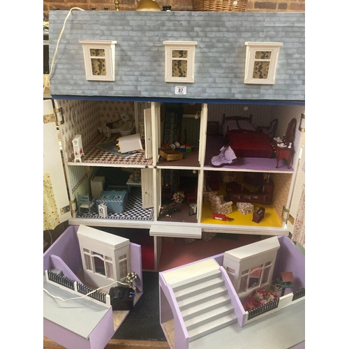 87 - PINK & WHITE PAINTED DOLLS HOUSE COMPLETE WITH MISC FURNITURE & ELECTRIC LIGHTING, 31'' WIDE X 26'' ... 