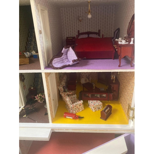 87 - PINK & WHITE PAINTED DOLLS HOUSE COMPLETE WITH MISC FURNITURE & ELECTRIC LIGHTING, 31'' WIDE X 26'' ... 