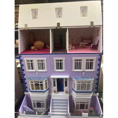 87 - PINK & WHITE PAINTED DOLLS HOUSE COMPLETE WITH MISC FURNITURE & ELECTRIC LIGHTING, 31'' WIDE X 26'' ... 