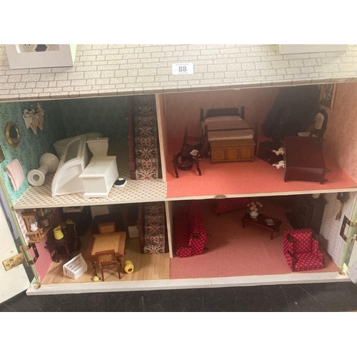 88 - GREEN & BROWN PAINTED DOLLS HOUSE, 26'' WIDE X 15'' DEEP X 24'' TALL