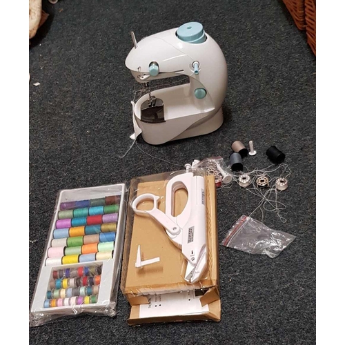 967 - BATTERY POWERED SEWING MACHINE, NOT KNOWN IF COMPLETE