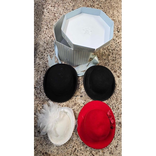 33 - HAT BOX WITH 2 BOWLER HATS IN BLACK & 2 LADIES HATS, 1 RED & 1 WHITE WITH FEATHERS