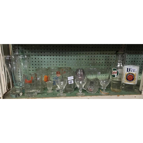 454 - SHELF OF GLASSES & GLASSWARE WITH ADVERTISING SLOGANS