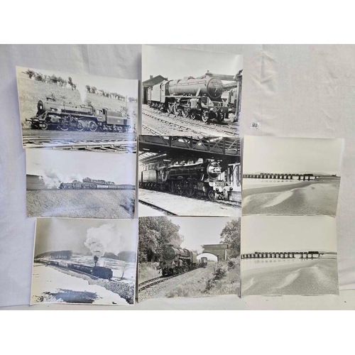 552 - A GROUP OF  8  LARGE FORMAT BLACK & WHITE PHOTOGRAPHS OF WORKING STEAM ENGINES. HAULING GOODS AND PA... 