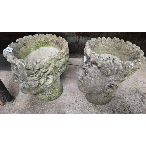 191 - PAIR OF WEATHERED RECONSTITUTED STONE PLANTERS IN THE FORM OF FACES