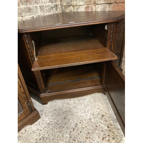 235 - LEADED GLASS FRONTED HI-FI CABINET & A LINEN FOLD FRONT CORNER UNIT