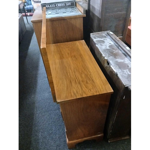 391 - FLAME VENEERED TILT TOP CHEST OF 4 DRAWERS