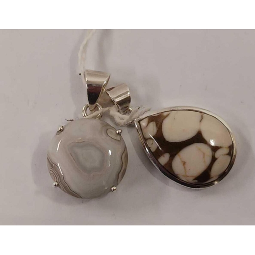 816 - TWO MOUNTED SILVER STONE PENDANTS