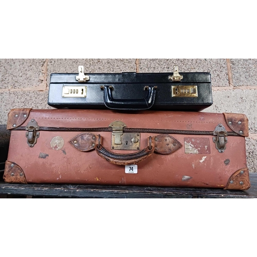 74 - BLACK LEATHER BRIEFCASE & A VINTAGE FIBRE SUITCASE