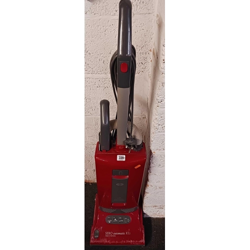 339 - RED UPRIGHT VACUUM CLEANER