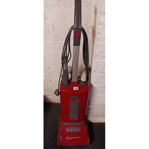 340 - RED UPRIGHT VACUUM CLEANER