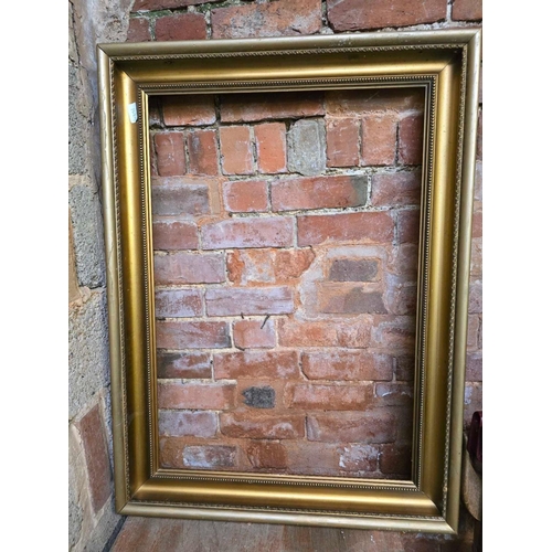 82 - LARGE GILT PICTURE FRAME APPROX, 39'' X 29''