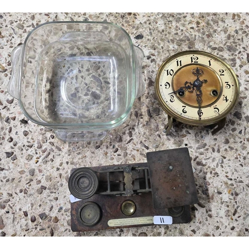 11 - GLASS DISH WITH A CLOCK MOVEMENT & A SET OF POSTAL SCALES WITH WEIGHTS