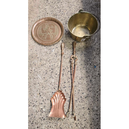 192 - 2 COPPER FIRESIDE IRONS, A BRASS JOHNNY WALKER TRAY, BRASS JAM PAN WITH METAL SWING HANDLE