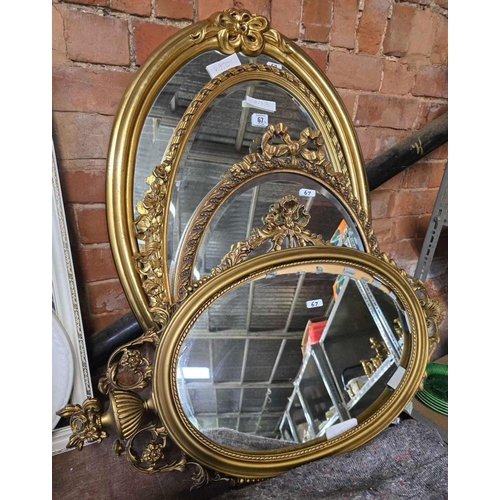 67 - 4 DECORATIVE GILT FRAMED OVAL MIRRORS