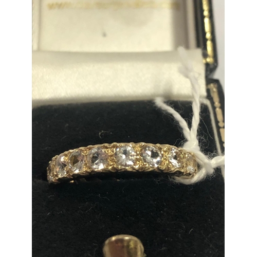 716 - A GOLD & WHITE STONE FULL ETERNITY RING, 3.4g