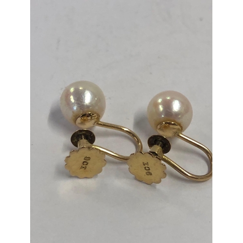 742 - A PAIR OF PEARL EARRINGS SET IN GOLD