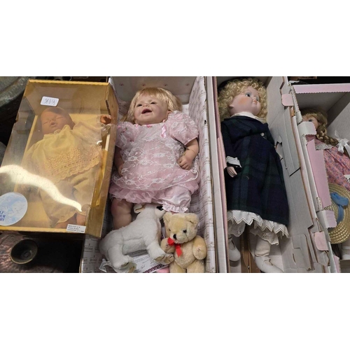 106 - 6 BOXED PORCELAIN DOLLS INCL;1 HALF HOUR BABY DOLL & FAITH BY THE ASHTON-DRAKE GALLERIES & 2 SOFT TO... 