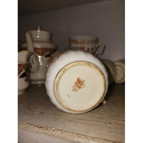 367 - SHELF OF CHINAWARE WITH COFFEE CANS, TEA CUPS, PLATES, JUGS,TEA POT ETC