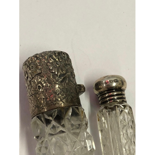 719 - TWO SILVER MOUNTED SCENT BOTTLES WITH GLASS BODIES ONE 1899