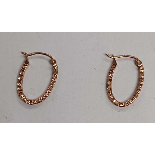 1047 - A PAIR OF 9ct HOOP SHAPED EAR CLIPS