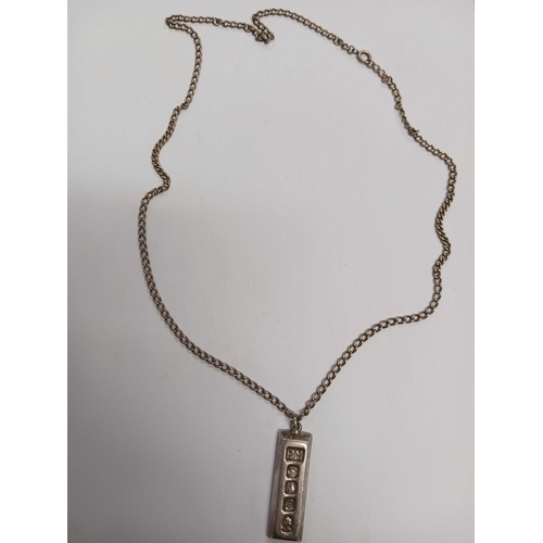 1056 - A BRITANNIA STANDARD SILVER INGOT ON CHAIN