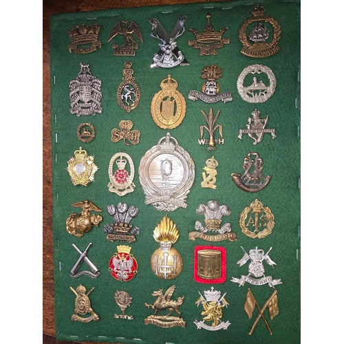 986 - PAD OF BRITISH ARMY & NAVY CAP BADGES MAINLY RE-STRIKES INCL; MINE CLEARANCE SERVICE