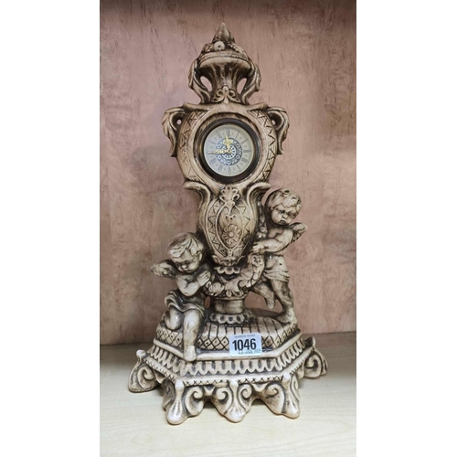 1046 - ORNATE CHINA CLOCK WITH 2 CUPIDS