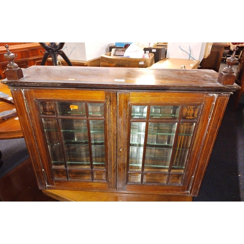 327 - INLAID MAHOGANY MIRROR BACK WALL CABINET WITH BEVELLED EDGE GLASS, PLUS FINIAL'S, 28'' ACROSS X 19''... 