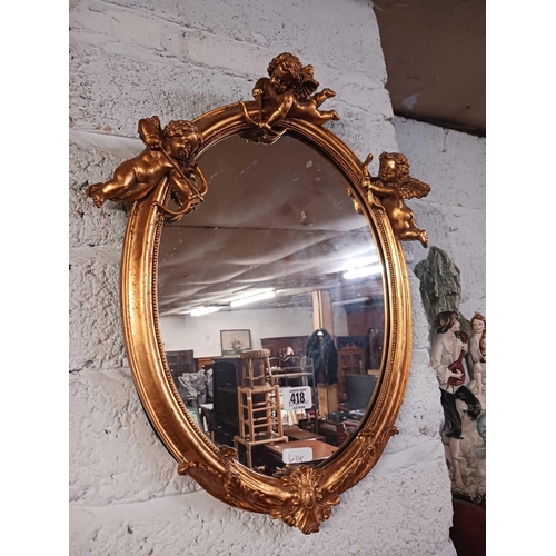 418 - GOLD GILT FRAMED MIRROR WITH CHERUB & A GOLD GILT FRAMED MIRROR