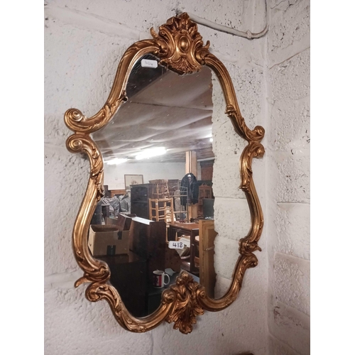 418 - GOLD GILT FRAMED MIRROR WITH CHERUB & A GOLD GILT FRAMED MIRROR