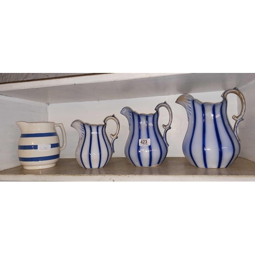 423 - GRADUATED TRIPPLE JUG SET & 1 OTHER BLUE & WHITE JUG