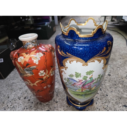 45 - 2 MISC CHINA VASES WITH BIRD DECORATION, 1 RED & 1 BLUE, BOTH APPROX 12'' TALL, RED VASE WITH CHIP T... 