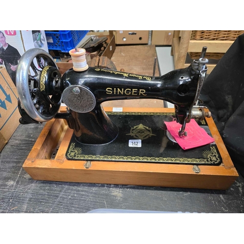 142 - SINGER HAND CRANKED SEWING MACHINE ON STAND, NO CASE