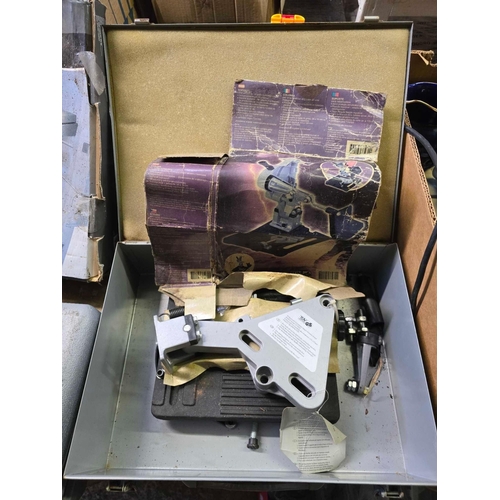 157 - AN ANGLE GRINDER STAND, NOT KNOWN IF COMPLETE, IN METAL BOX