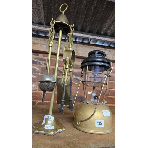 195 - BRASS FIRESIDE SET & A TILLY LAMP