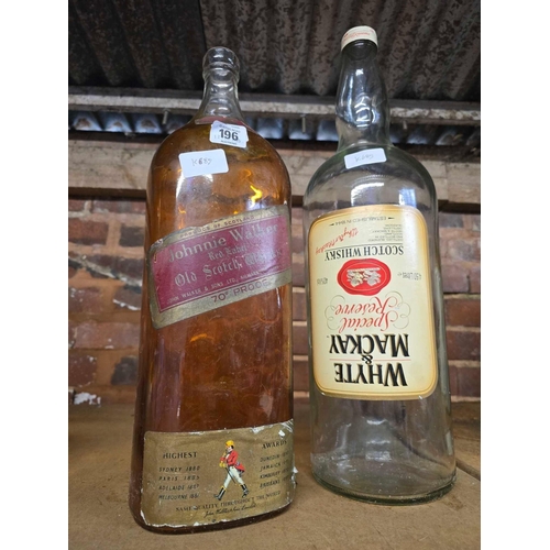 196 - 2 LARGE EMPTY GLASS WHISKY BOTTLES