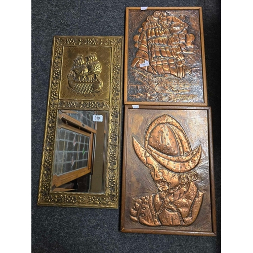 310 - A DECORATIVE EMBOSSED AND BRASS BOUND BEVEL EDGED MIRROR AND TWO 	             COPPER PLAQUES