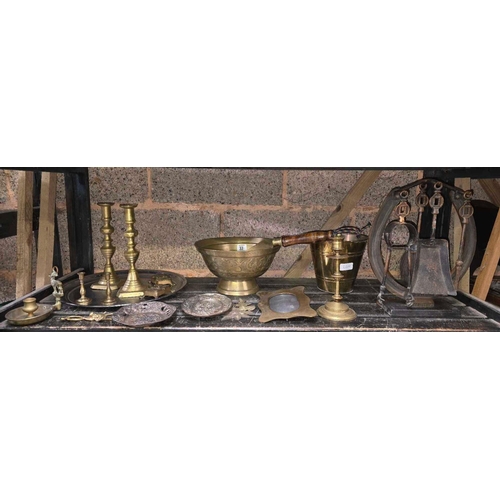 33 - SHELF OF MISC BRASS WARE INCL; CANDLESTICKS & A COPPER EFFECT FIRESIDE COMPANION SET