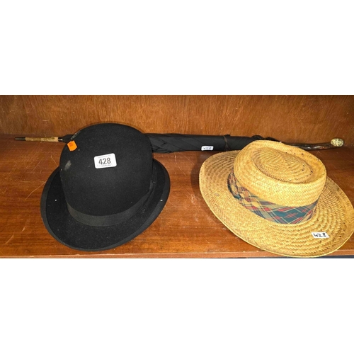 428 - A BOWLER HAT, STRAW HAT & AN UMBRELLA