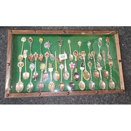 434 - FRAME OF SOUVENIR COLLECTOR SPOONS INCL; NEW ZEALAND & SINGAPORE