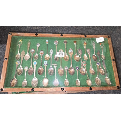 439 - FRAME OF SOUVENIR COLLECTOR SPOONS INCL; YEOVIL & IRAN