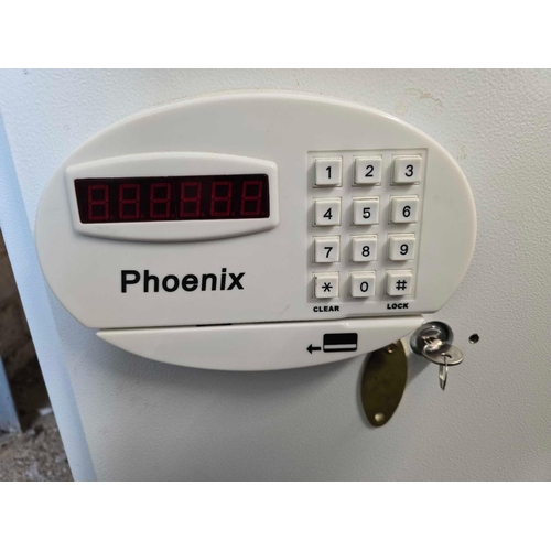 631 - A PHOENIX COMBINATION LOCK FLOOR SAFE WITH KEY