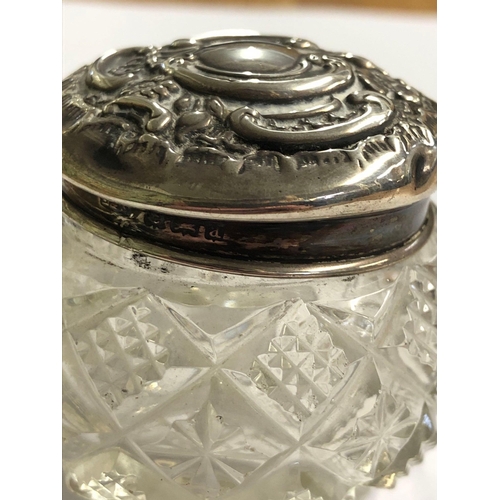 692 - A SILVER EMBOSSED TOP JAR, B'HAM 1906