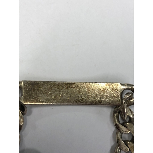 816 - A SILVER FLAT LINK IDENTITY BRACELET